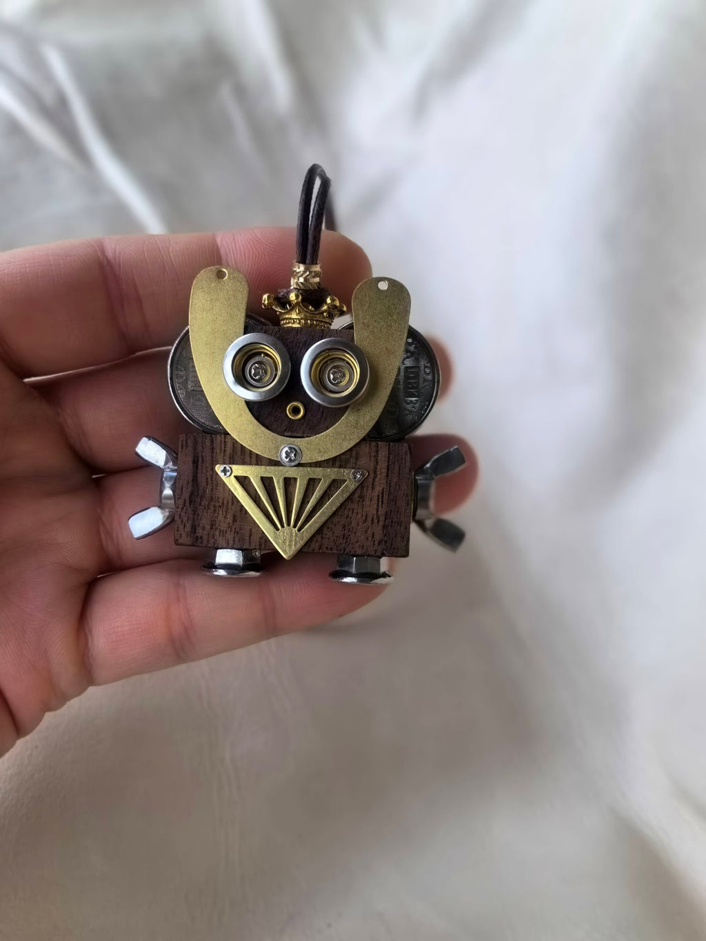Onyx – Black Goggle Eyes & Golden Crown Double-Sided Robot Charm