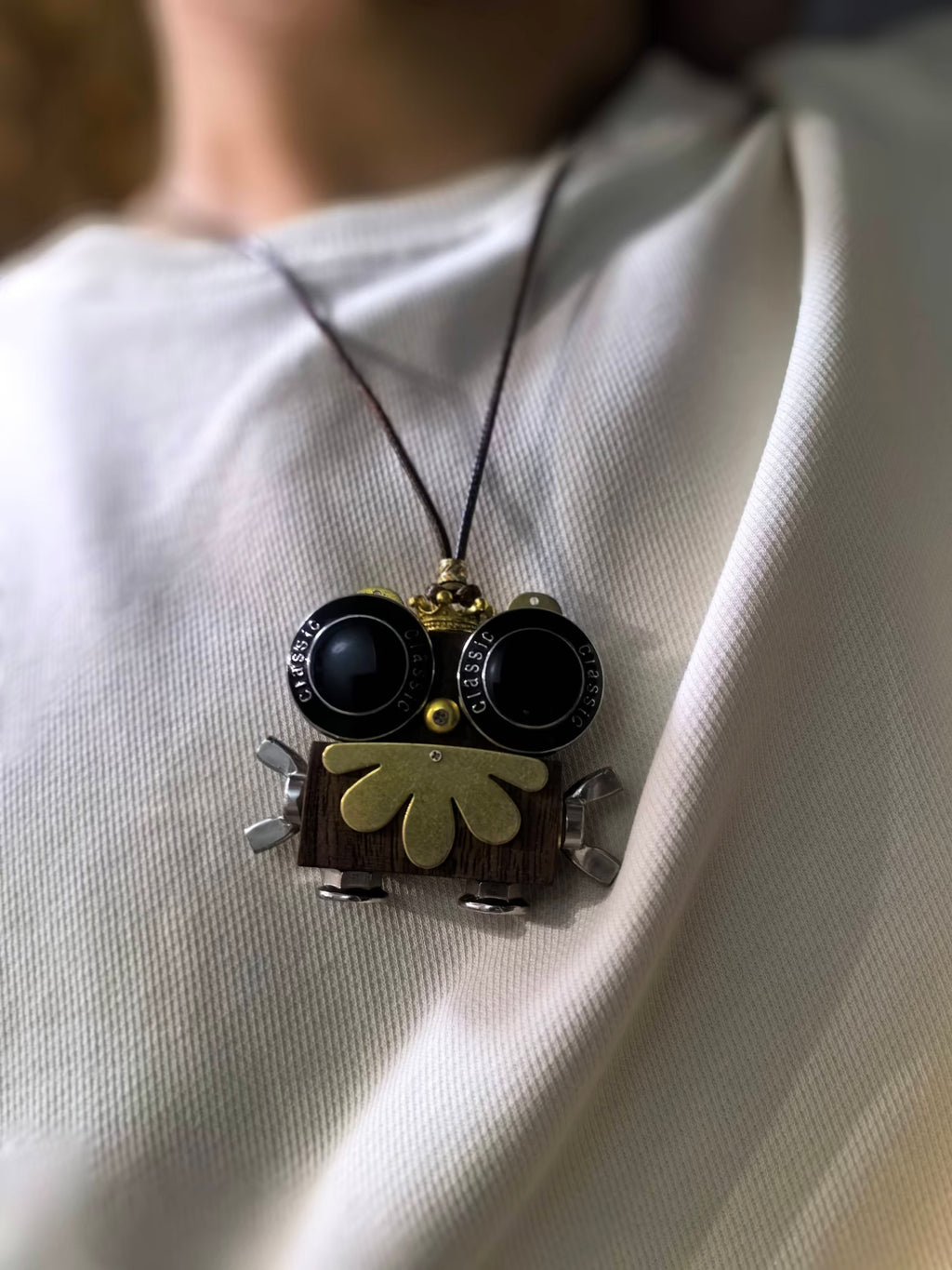 Onyx – Black Goggle Eyes & Golden Crown Double-Sided Robot Charm