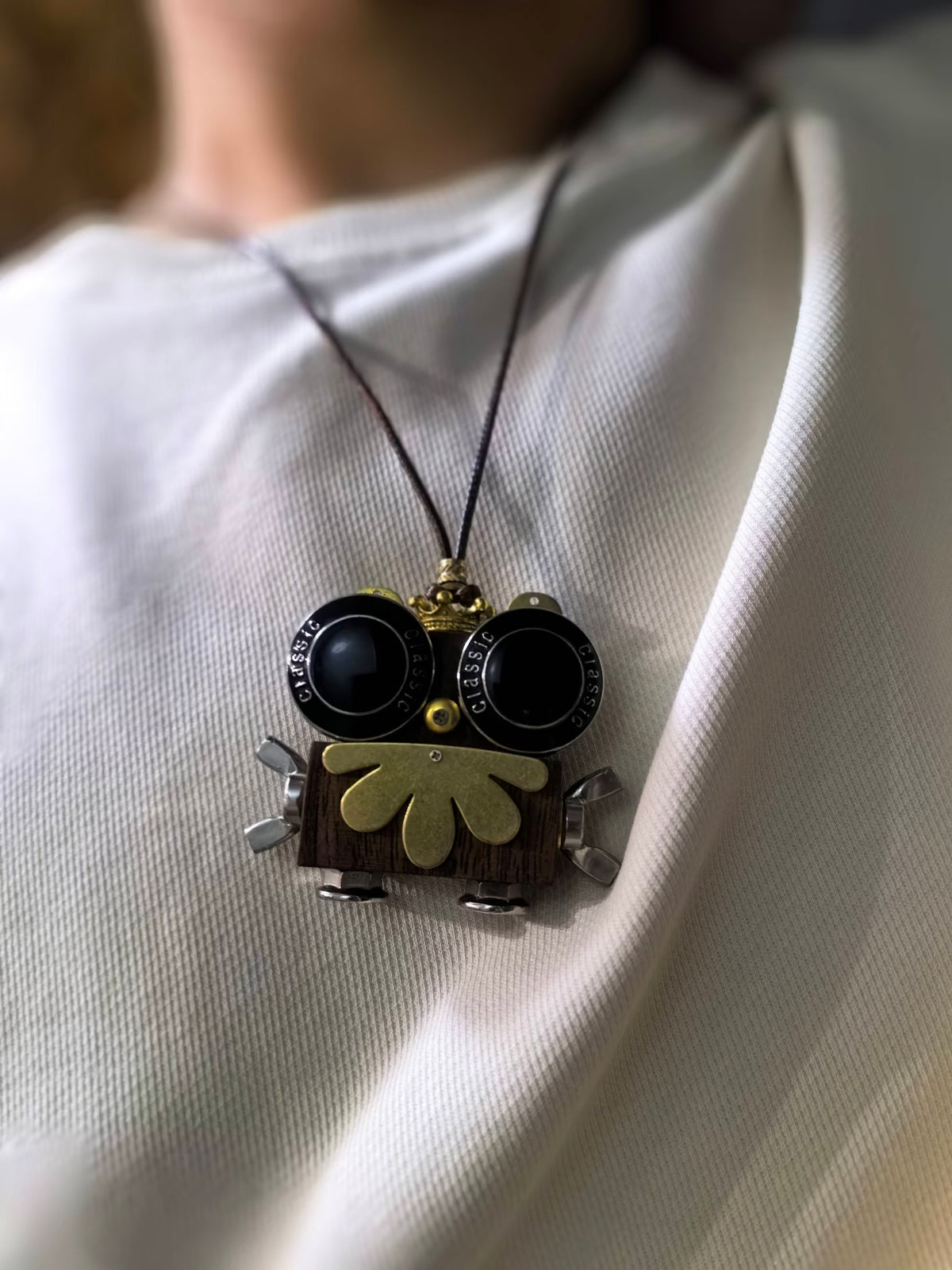 Onyx – Black Goggle Eyes & Golden Crown Double-Sided Robot Charm