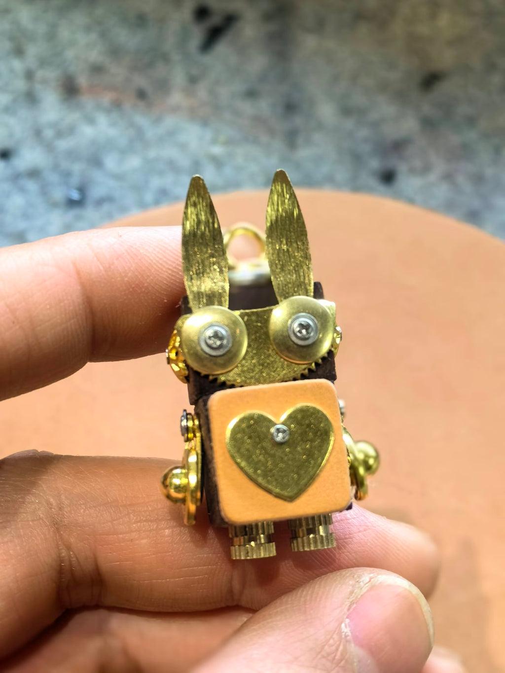 Lumi – Golden Bunny Ears & Heart Emblem Single-Sided Steampunk Robot Charm