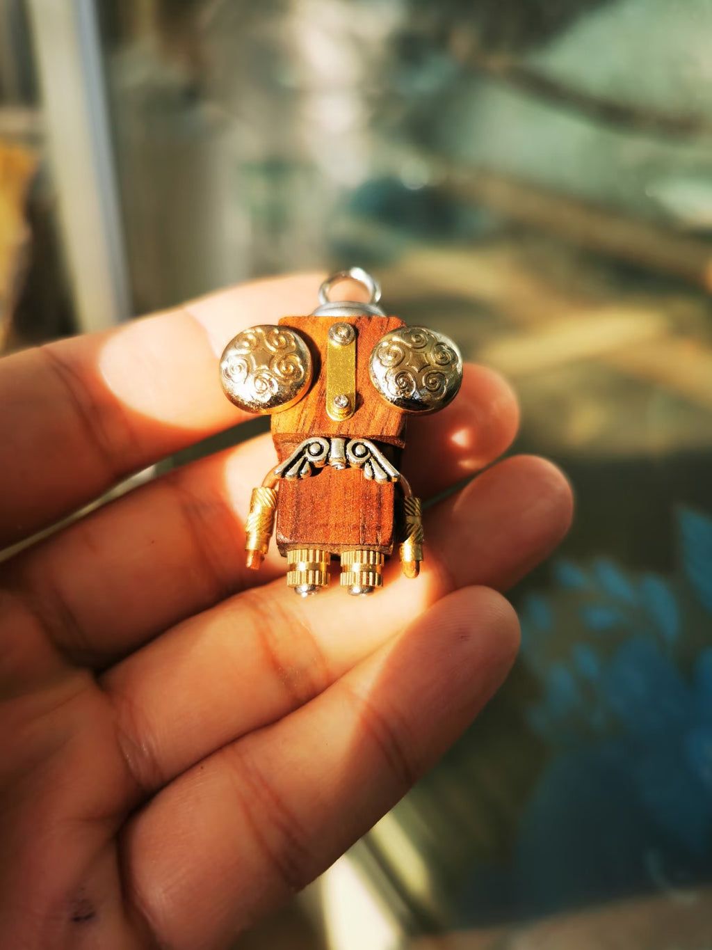 Cleo – Scrollwork Eyes & Silver Wings Single-Sided Steampunk Robot Charm