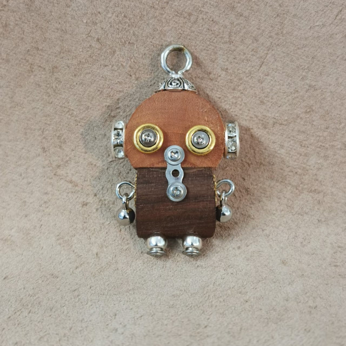 Nova – Spiral Eyes & Golden Bow Double-Sided Steampunk Robot Charm