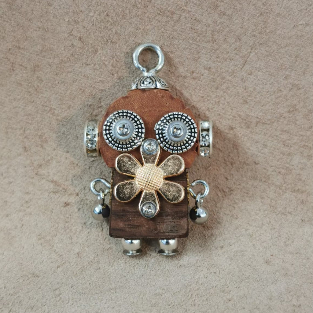 Nova – Spiral Eyes & Golden Bow Double-Sided Steampunk Robot Charm