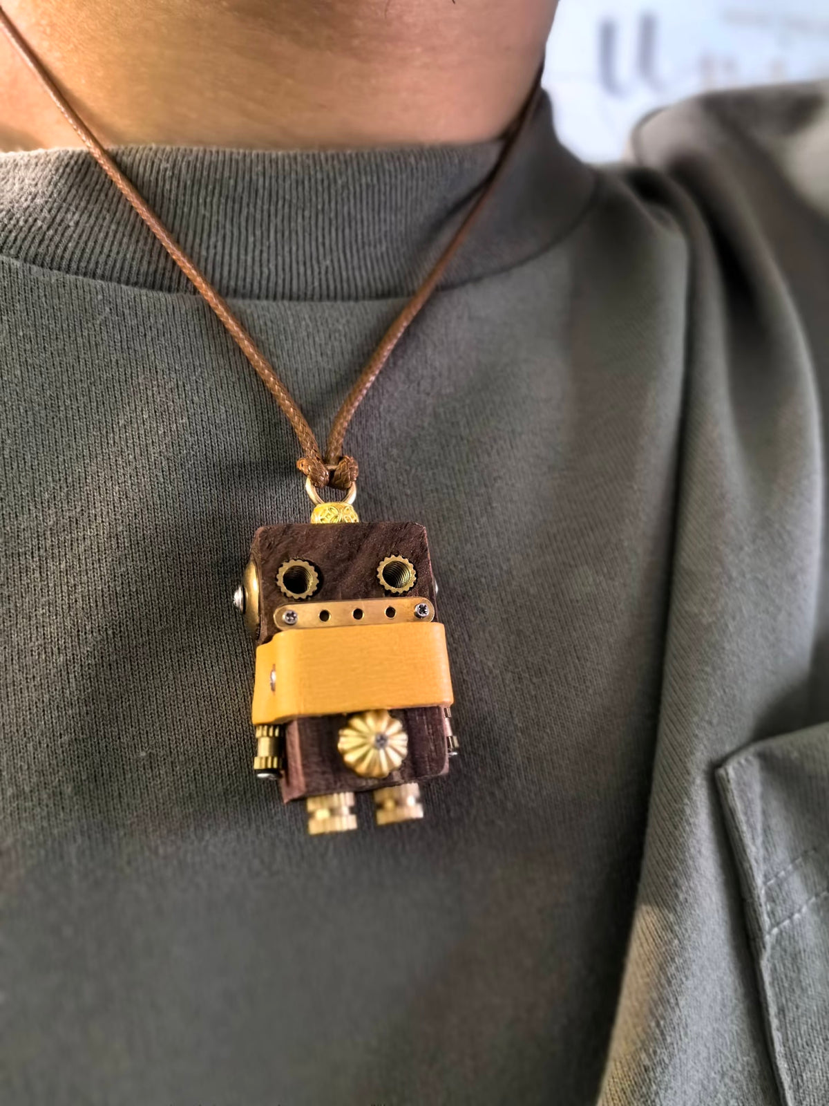 Gus – Socket Eyes & Sunburst Gear Single-Sided Steampunk Robot Charm