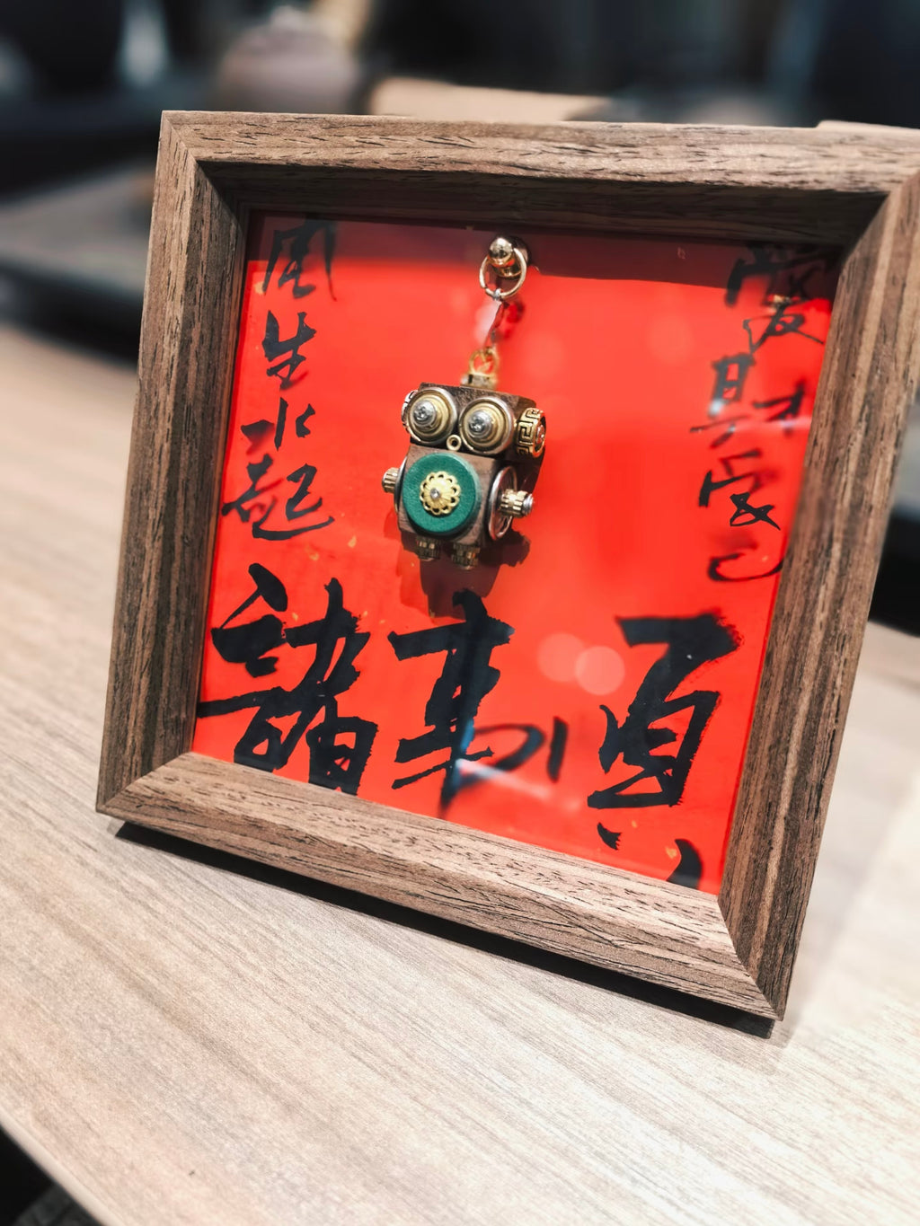 Golden-Eyed Steampunk Robot Pendant with Green Floral Detail