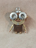 Bruno – Silver Star Eyes & Golden Bow Double-Sided Steampunk Robot Charm