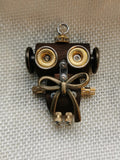 Golden-Eyed Steampunk Robot Charm with Oversized Bow – Handmade Wood & Metal